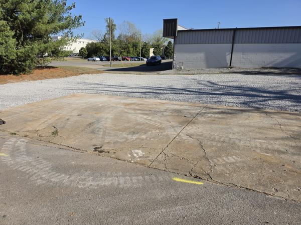 After: new rock graded up to the existing pavement